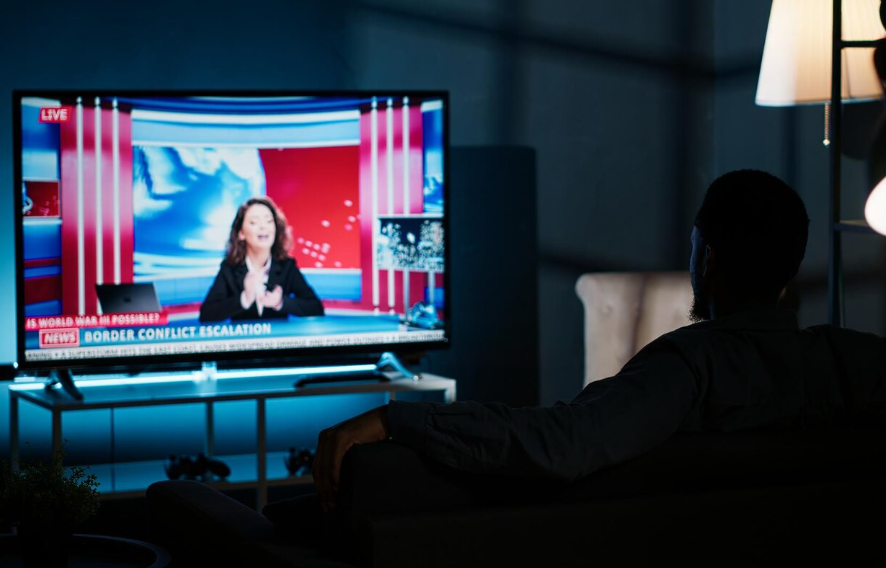 Viewer finds the cheapest way to watch live TV without cable while watching news at home.